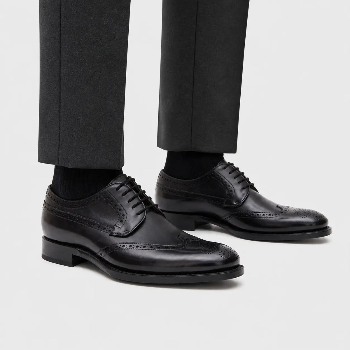 Black Wingtip Derby Shoes with Polished Finish