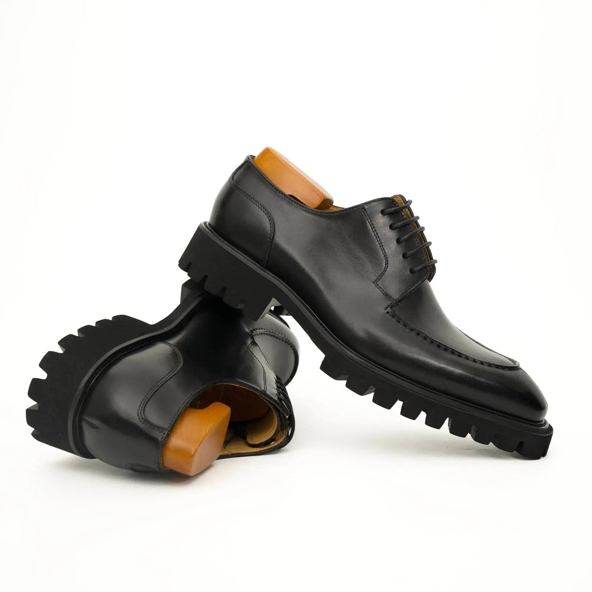Black Calfskin Apron-Toe Derby Shoes with Lug Sole