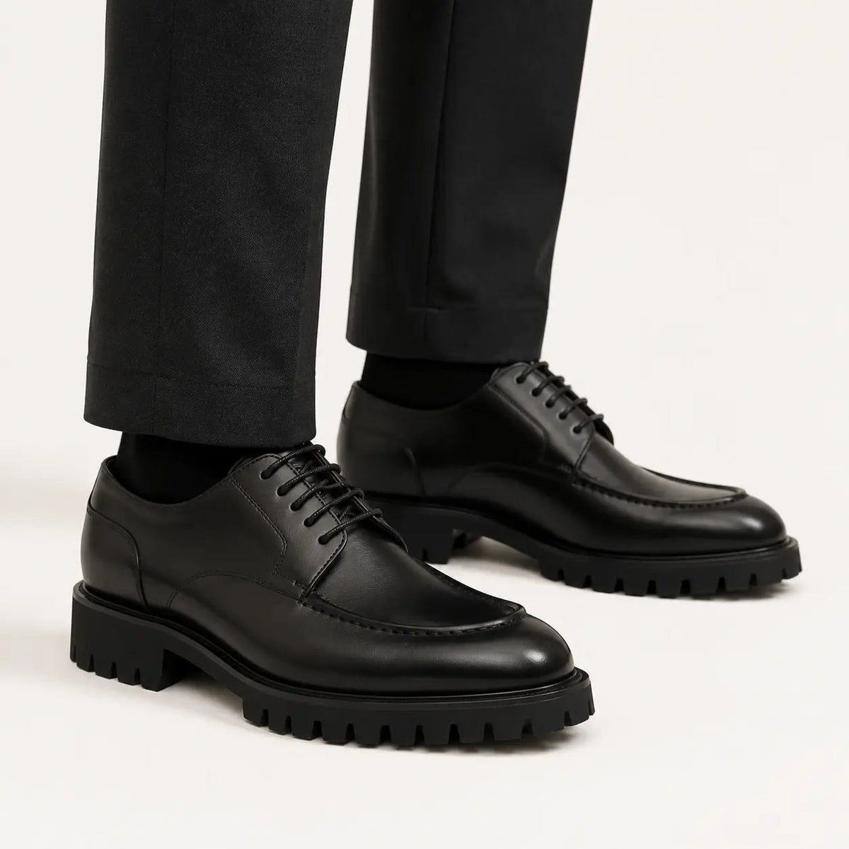 Black Calfskin Apron-Toe Derby Shoes with Lug Sole
