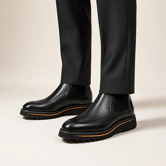 Black Wingtip Chelsea Boots with Brown-Edge Lug Sole