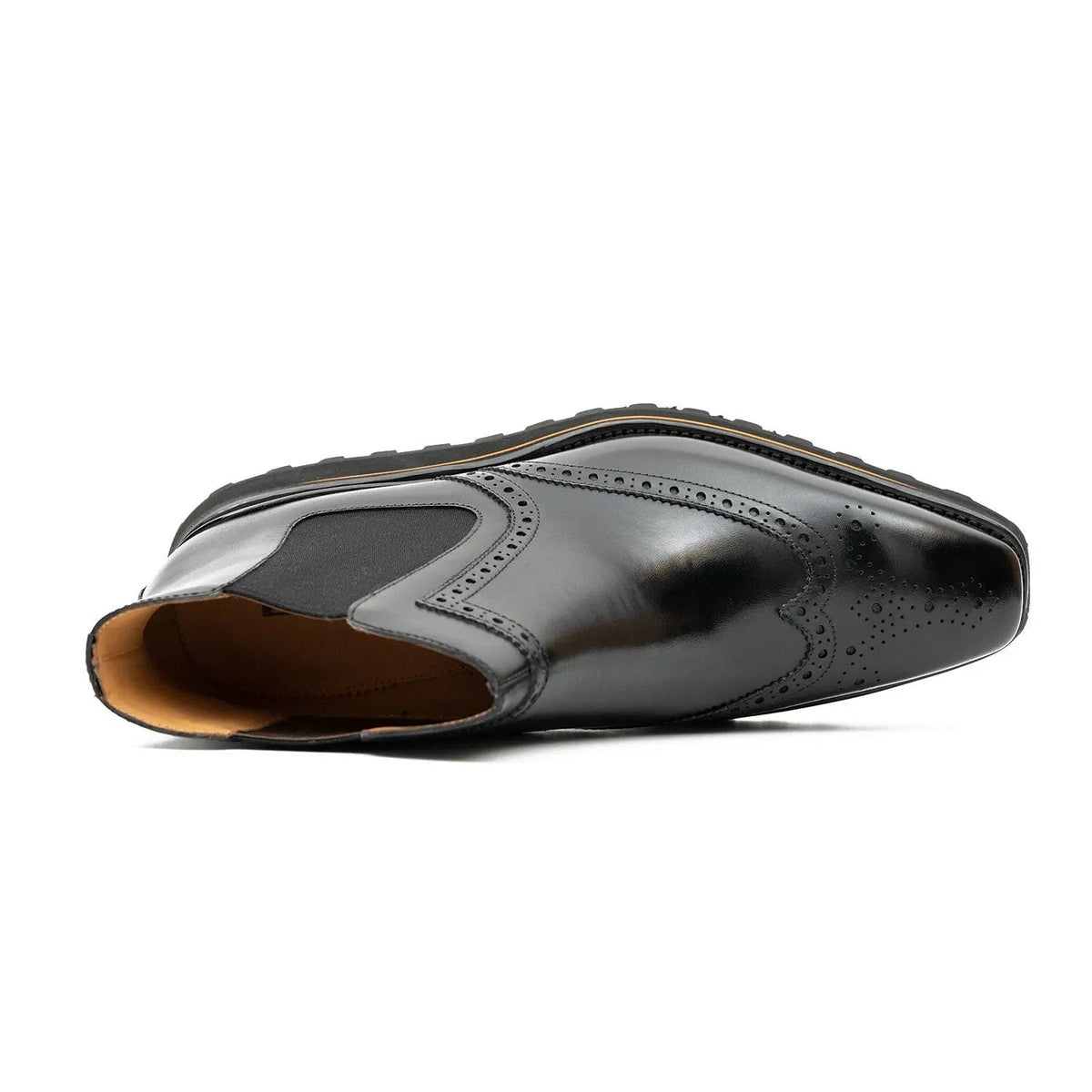 Black Wingtip Chelsea Boots with Brown-Edge Lug Sole